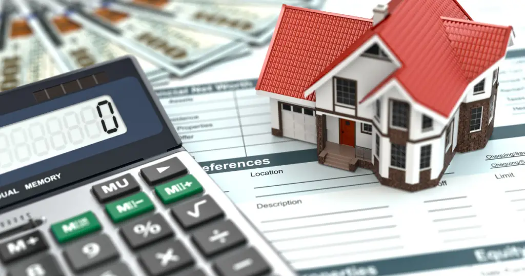 Calculator and miniature house model on top of a document with cash in the background