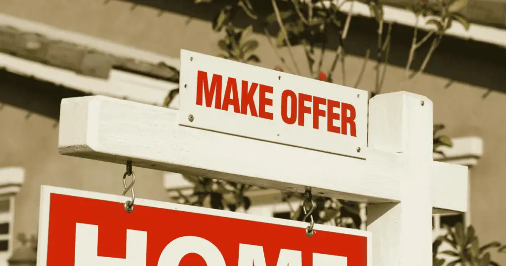 For sale sign with a make offer sign on top