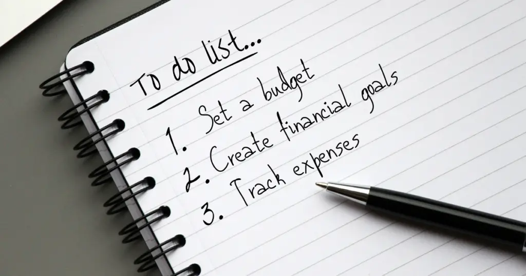 To do list on a tablet that says, 1 Set a Budget 2 Create Financial Goals 3 Track Expenses